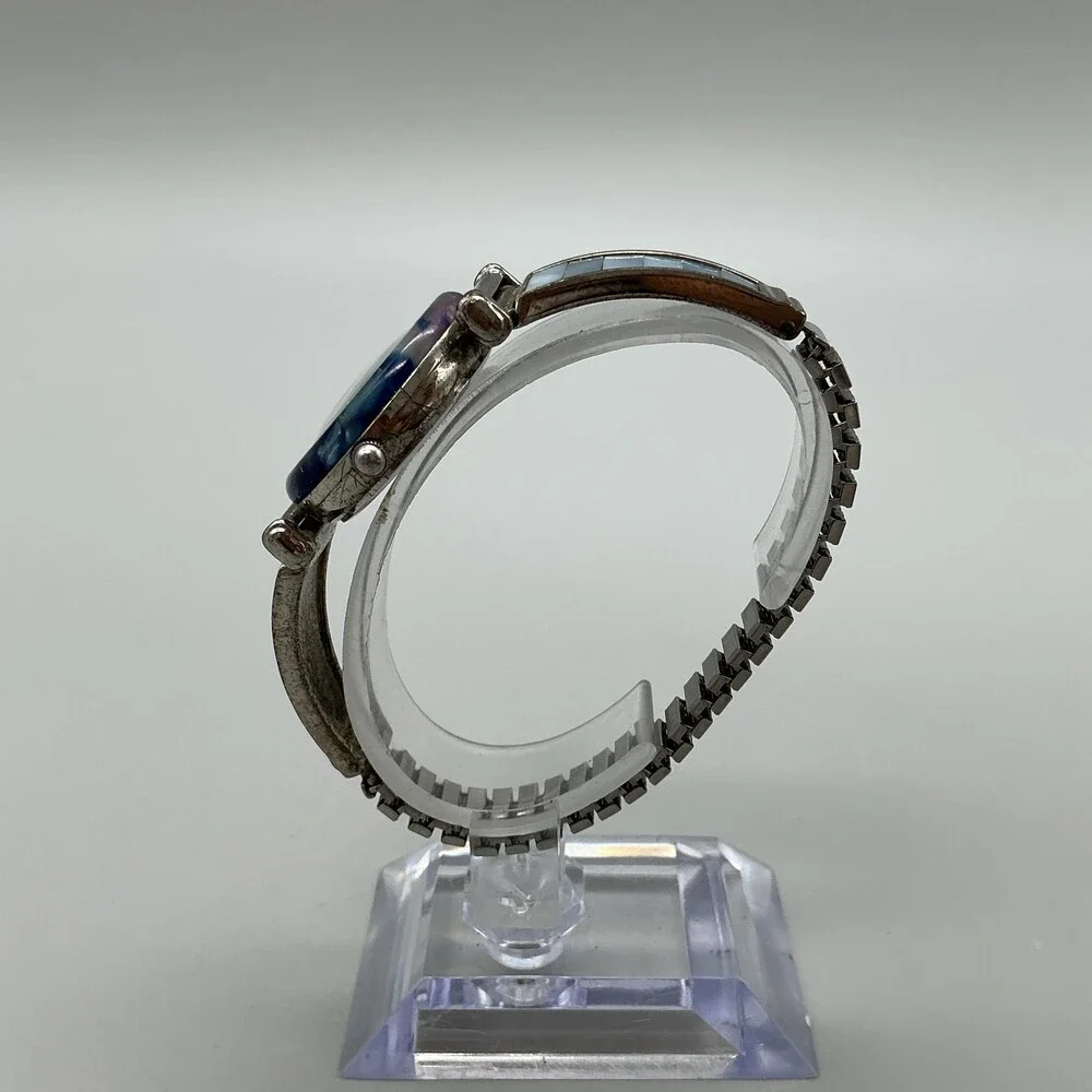 Avon F69038-1/P Women Watch 27mm Silver Tone Blue Bezel Stretch Band New Battery